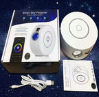 The white halo star projector shown next to its retail box, user manual and USB power cable on starry background