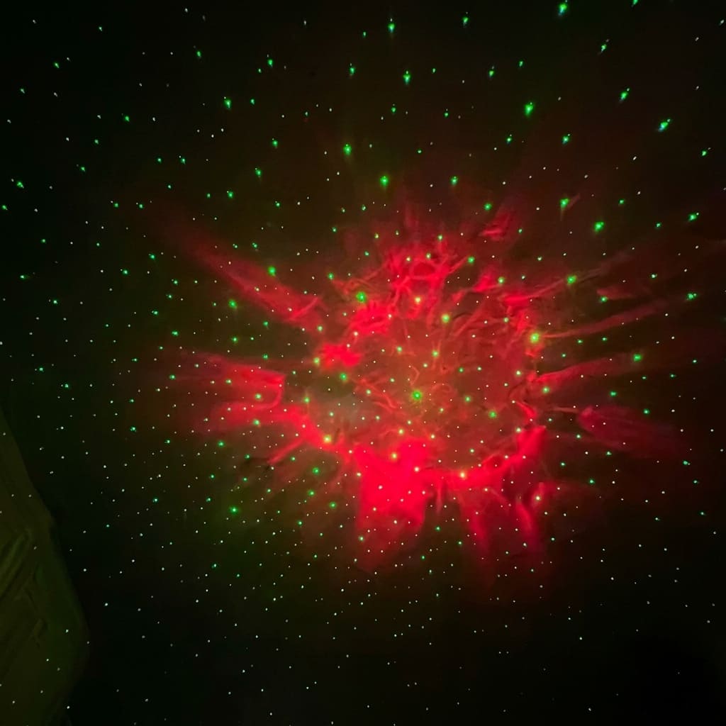 red nebula clouds on dark room ceiling